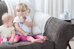 What causes Cystic Fibrosis?